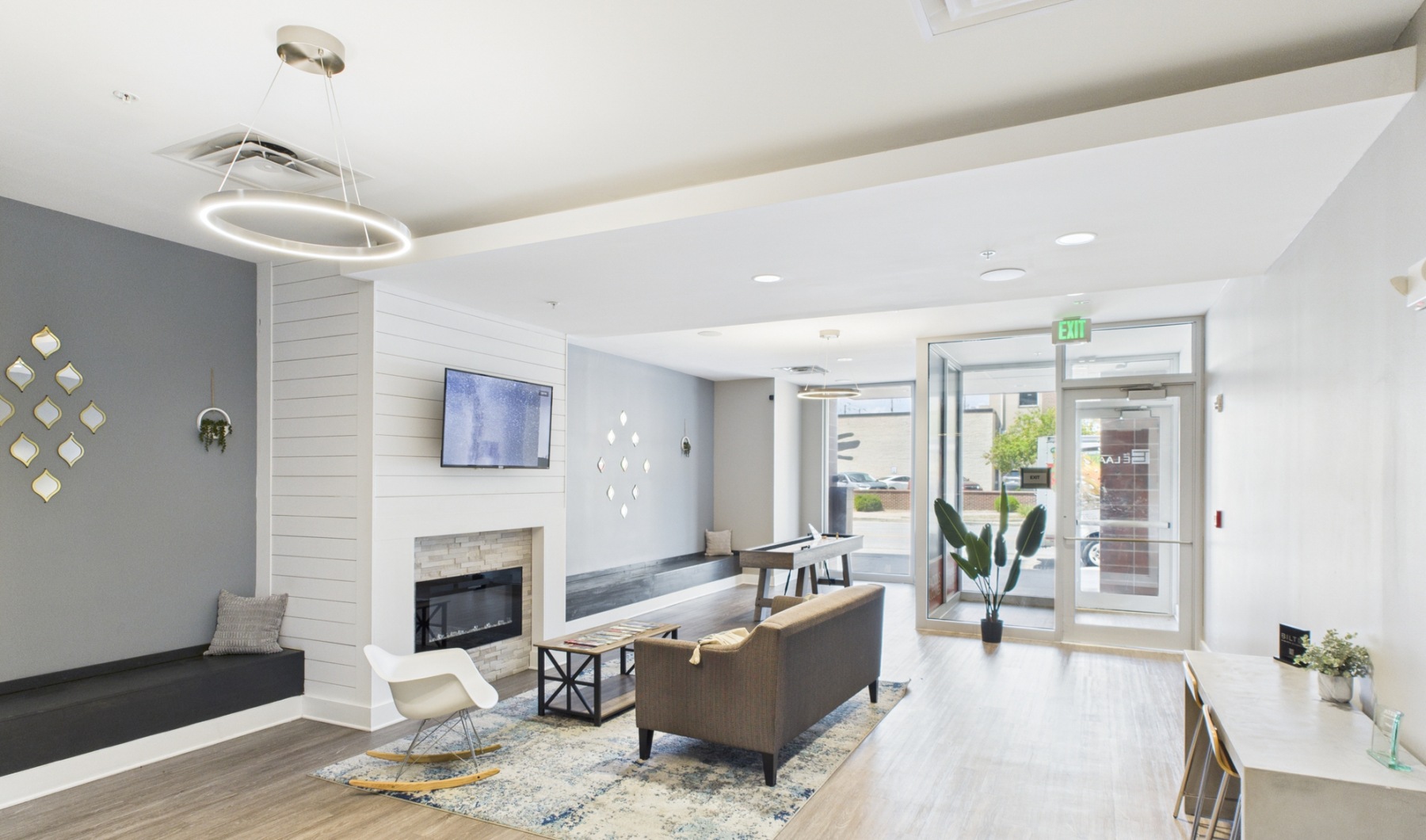 Downtown Indy living at its best Apartment community clubhouse with furniture